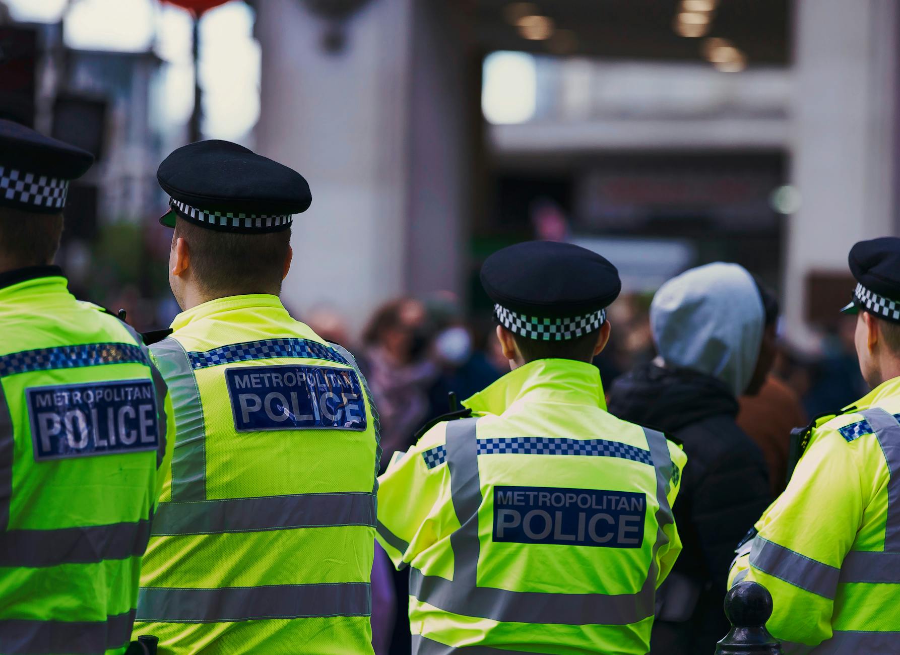 metropolitan police officers in london street scene
